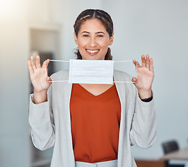 Image showing Covid, face mask and happy woman holding a medical and corona safety product. Covid 19, instruction and healthcare coach woman with a happy smile portrait teaching how to use health care masks