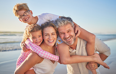 Image showing Family, beach and happy kids with quality time together on a summer vacation travel in the sun. Happiness of mother, man and children portrait in sunshine with a smile, hug and fun in nature