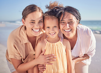 Image showing Family, love and children with a girl, mother and grandmother on the beach for summer vacation. Portrait, travel and nature with a senior woman, daughter and kid by the sea or ocean in Hawaii