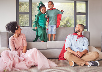 Image showing Halloween, family and kids celebrate in costume happy, excited and bonding in living room. Love, parents and children on couch having fun, being playful and relax for fantasy party at family home.