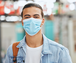 Image showing Face mask, covid compliance or man in city, airport or commute travel in government healthcare law. Portrait, student or tourist in covid 19 safety in immigration, medical security or urban traveling