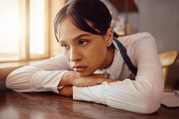 Image showing Sad waiter in Paris cafe, woman tired at table in bistro and hospitality service industry job. Disappointed face in small business, bored fatigue at restaurant and mental health depression at work