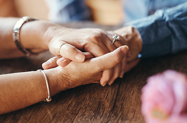 Image showing Macro, couple and elderly people holding hands on table for support, love and care in home. Zoom, senior and hand together for bonding, anniversary and romance in marriage, life and retirement