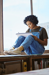 Image showing Creative, art and woman drawing by a window and sitting in her artistic studio or workshop. Creativity craft, hobby and professional girl artist sketching an illustration or design in her workspace.