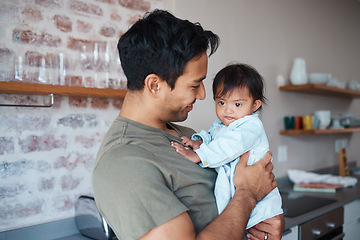 Image showing Down syndrome, love and father with smile for baby in the kitchen of their house together. Young child with development disability and special needs with care from happy dad in their family home