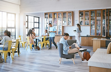 Image showing Education, students and learning in library at university in relax, funky and creative study room. Diversity, college and learners in social space, reading, homework and research with book and pupils