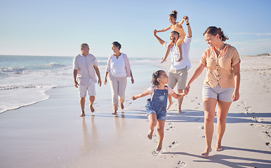 Image showing Family, beach and happy in cancun vacation in summer with smile, laugh and love together walking on the sand. Laugh, bonding and chasing joy while men, women and kids playing on holiday travel