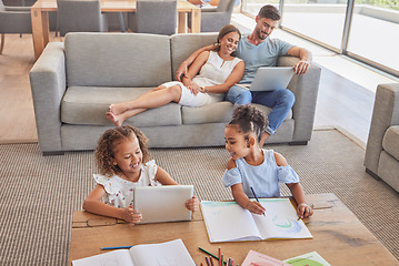 Image showing Family, children and education with a girl learning about art with a book and tablet in the living room with their parents. Kids, student and homeschool with a mother, father and daughter in a house