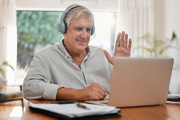 Image showing Video call, laptop and wave with a senior businessman chatting online with headphones and a computer at home. Conference, internet and communication with a mature male employee remote working