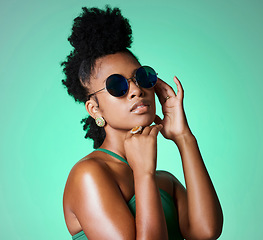 Image showing Fashion, beauty and retro black woman with sunglasses for vintage style, trend or eye protection. Face accessory, gen z and cool African girl or person with funky hairstyle, hipster shades and trendy