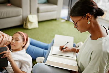 Image showing Writing, studying and woman student exam learning with a friend busy with university education. College students together with diversity, tired study burnout and scholarship work in a school dorm