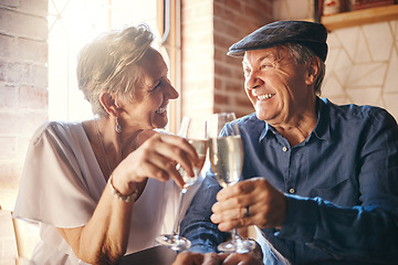 Image showing Elderly couple with champagne toast in restaurant together for anniversary. Senior man and woman with alcohol drink celebrating love, family and marriage. Celebration and cheers to being married