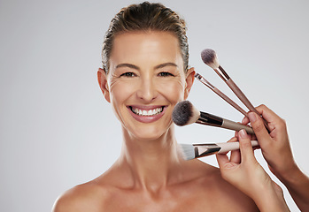 Image showing Beauty, makeup and cosmetic brush by a senior woman face with a happy smile in a studio. Portrait of a elderly person face from Paris with happiness, cosmetics brushes and healthy skin smiling