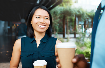 Image showing Coffee, communication and Asian woman and black man in city, conversation or talking while drinking espresso. Tea, chatting and business people speaking or in discussion on a break outdoors together.