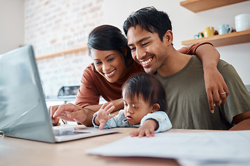 Image showing Mom, dad and baby in kitchen with laptop, happy family from Mexico checking online payment or video call. Mother, father and child with down syndrome at computer in home streaming educational video.