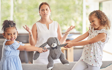 Image showing Toys, fight and kids with angry children in conflict while mother confused about family problems or communication. Girl siblings upset about teddy bear with mom trying to talk in home living room