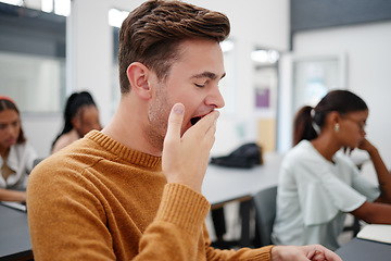 Image showing Burnout, tired student or yawning man sleepy in school, college or university class from overwork, exhausted or mental health. Yawn, scholarship study or education with fatigue or overwhelm to male.