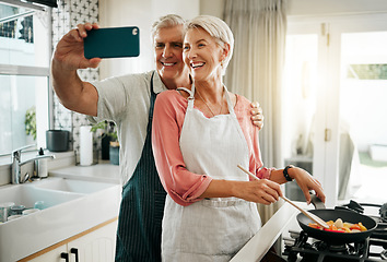 Image showing Old couple, phone selfie and cooking in kitchen, delicious meal and food in home. Love, smile and happy elderly retired romantic man and woman cook breakfast in the morning and take picture together.