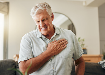 Image showing Senior man, heart attack and stroke at home for emergency health risk, breathing problem and cardiology accident. Sick elderly male with chest pain cancer, cardiovascular disease and heartburn injury