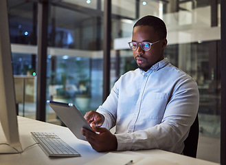 Image showing Black businessman, tablet and data analysis with computer in night office for digital marketing software, cybersecurity code or kpi. Thinking programmer, developer or website designer with technology