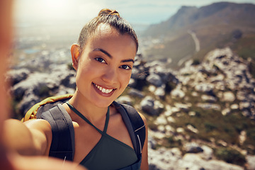 Image showing Portrait, happy and woman hiking with a selfie in nature on a mountain during summer. Face, fitness and exercise latino woman or tourist smile while exploring during trekking outdoor with backpack