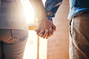 Image showing Love, support and elderly couple holding hands in unity and hope after cancer diagnosis. Trust, help and compassion with senior man and woman standing in power and togetherness for health challenge