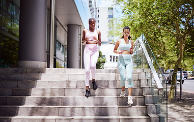 Image showing Running steps, city fitness and women cardiovascular exercise training, workout and healthy lifestyle in urban outdoors. Two diversity athlete, runner and motivation in sports, strong body and pace