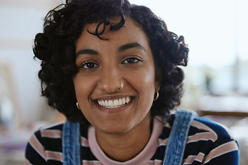 Image showing Face, portrait and happy with a young woman feeling carefree or cheerful with a smile closeup. Head, teeth and nosering with an attractive, trendy or edgy female with a piercing on a blur background