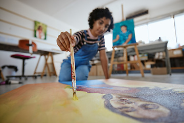 Image showing Black woman artist, canvas art painting on floor and using creativity with paintbrush to make unique artwork. Creative African American girl, working in studio workshop and using watercolor oil paint