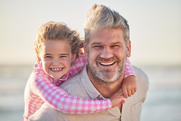 Image showing Happy, father and girl being on back smile, laugh and playing together outside on trip. Parent, kid and child fun, enjoy and relax being playful and bonding on weekend, holiday and vacation at beach