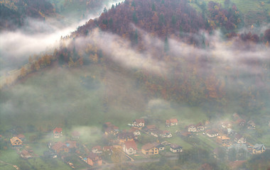 Image showing Mountain village through the clouds