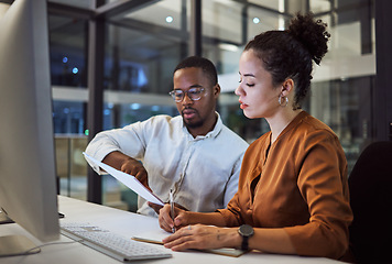 Image showing Teamwork in New York office at night, business document reading together and professional accounting report. Black man with financial audit, showing latino woman figures and employee collaboration