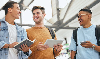 Image showing Friends, university and students at campus, talking and planning a group assignment on digital tablet and sharing notes. Education, diversity and men walking and laughing, prepare team project