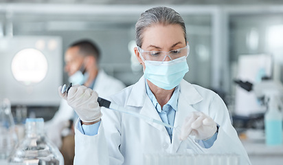 Image showing Covid, lab mask and vaccine research woman with medicine analysis test tube in a lab. Medical development, innovation and professional science expert working on new medical analytics in a laboratory