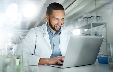 Image showing Science, research and laptop with man in laboratory working on analytics, pharmacy or medical. Innovation, internet and technology with scientist writing email for analysis, digital or healthcare