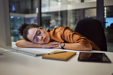 Image showing Stress, burnout and sleeping business woman in modern office, workplace at night. Tired, lazy and frustrated employee, worker and black person in nap for depression, deadlines and mental health fail