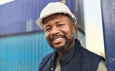 Image showing Logistics, supply chain and shipping with a black man delivery worker standing outdoor on a commercial dock. Stock, retail and cargo with a male courier working in the export or service industry