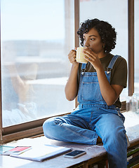 Image showing Woman, coffee or thinking by window in creative studio, Indian art gallery or painting workshop with phone or notebook. Artist, designer or painter with technology, ideas or innovation vision and tea