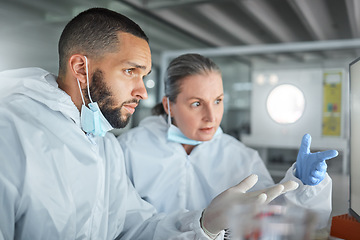 Image showing Laboratory, teamwork and hands with science worker in collaboration at pc screen. Scientist, focus and research in discussion to talk about data, information or analytics on computer at lab in ppe