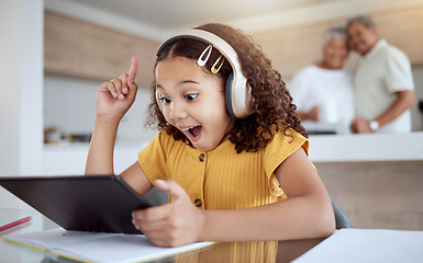 Image showing Excited, homeschool tablet or girl with ideas, learning motivation or education innovation in homework study on headphones. Smile, happy and student child with technology in senior grandparents house