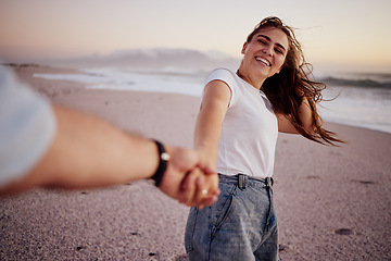 Image showing Pov, couple and holding hands on beach, sand and happy together, relax and smile on holiday, vacation and trip. Love, man and woman on seaside getaway enjoy the sunset, embrace and fun being romantic