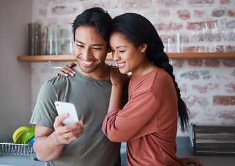 Image showing Asian couple, phone or bonding hug in house or home kitchen with communication technology, social media app or internet news. Smile, happy and love man and relax woman with mobile for zoom video call