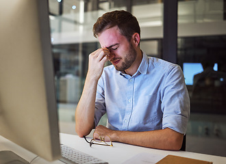 Image showing Burnout, stress and tired businessman with mental health problems struggling while working overtime in an office. Depression, headache and frustrated manager with eye strain, exhausted and overworked