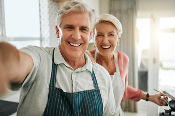 Image showing Selfie, senior couple and cooking in kitchen with smile, laugh and fun at their house prepare lunch together. Pov, elderly, man and woman baking in their home romantic, loving and bonding with food.