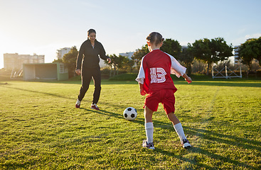 Image showing Soccer, coach and child sport on a outdoor school field with a ball for fitness and exercise. Trainer training a kid student for football training, workout and children sports game kick together