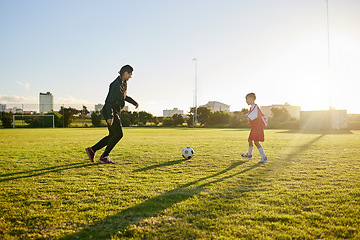 Image showing Fitness, soccer and coaching with girl and sports training with ball in park for goals, support and workout. Mentor, learning and motivation with child and coach training for football field exercise