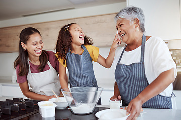 Image showing Women, happy family and bake food in kitchen smile together love cooking dessert and bonding at family home. Excited, happiness and smiling elderly grandmother, mom and girl kid baking fun at house