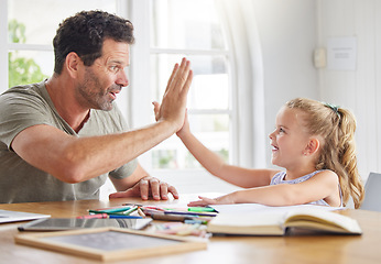 Image showing Education, learning and high five for girl in support of success and educational goal by father, excited and bonding at a table. Motivation, winning and happy parents help child with creative project