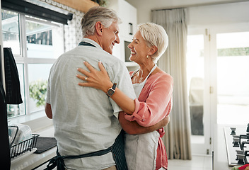 Image showing Cooking dance, dinner and senior couple dancing with smile while making lunch in the kitchen of house. Happy elderly man and woman doing jazz movement with love to music while preparing food in home