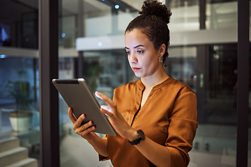 Image showing Tablet, night and research with a business woman working late on the internet while on the search for data or information technology. Innovation, cloud computing and ux with a female employee at work